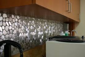 The tiles interlock to create a virtually seamless appearance. Eden Mosaic Tile Installations River Rock Pattern Mosaic Stainless Steel Tile Contemporary Kitchen Miami By Eden Mosaic Tile Houzz