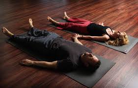 Easy pose (sukhasana) with forward bend. Partner Yoga Doubles The Pleasure And Reduces Stress Cnn