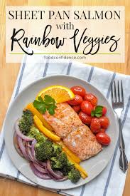 Sheet Pan Salmon With Rainbow Veggies An Easy One Pan Dinner That S On The Table In Under 30 Minutes And Packed With A Rainbow Veggies Salmon Recipes Veggies