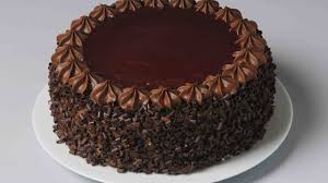 Make this chocolate cake for a party and let kids decorate different parts of the cake to create an edible collage. How To Decorate Chocolate Cake Easy Cake Decoration Atul Kochhar Youtube