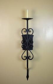 Tuscan wall sconces with playful metal ornamentation could be perfect. Barcelona Sconce Spanish Interior Lighting Forja Lighting Spanish Lighting Fixtures Sconces Spanish Interior