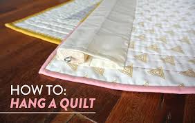 Also, easy to adjust by pulling out the extendable rod for different quilt sizes (and to make sure the quilt hangs straight on the wall). How To Hang A Quilt Suzy Quilts