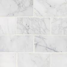 I have a white kitchen and calacatta laza countertops. Calacatta Cressa White Marble 3x6 Subway Tile
