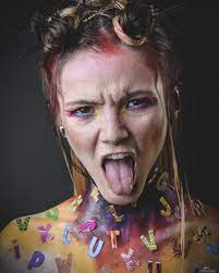 Some characters are accented versions of usual latin letters, some are from completely different language families, some even are maths symbols. Young Girl With Creative Alphabet Makeup Faces Studio