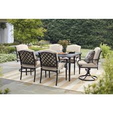 Hampton Bay Laurel Oaks 7 Piece Brown Steel Outdoor Patio Dining Set With Cushionguard Putty Tan Cushions 525 0200 000 The Home Depot Hampton Bay Patio Furniture Patio Dining Furniture Patio Dining Set