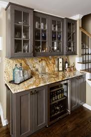 Showcased contemporary home bars one an integral part of the dining room and one independent with refrigeration, wet bar, dish washer and pantry for large storage area. Indianapolis Wet Bars Home Bar Transitional With Built In Kitchen Dark Wood Bathroom Vanities Tops