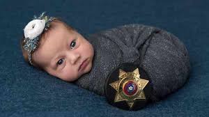 Newborn photos honor deputy who helped deliver baby