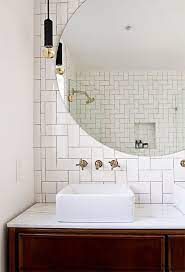 Consider a modern mantel mirror to draw the eye upward, highlighting other decor on the shelf and make the room appear bigger all at once. Feedly Organize Read And Share What Matters To You Round Mirror Bathroom Bathroom Design Bathroom Inspiration