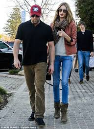 He was a diver on the british national diving team and finished twelfth in the world championships in 1992. Rosie Huntington Whiteley Dwarfs Boyfriend Jason Statham In High Heels During A Romantic Boxing Day Lunch Daily Mail Online
