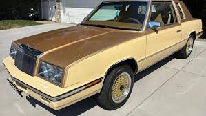 Image result for Saddle Brown 1984 Chrysler