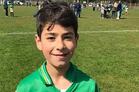 Syrian refugee makes scoring debut for Michael Davitts GAA club in  under-10s hurling match