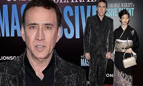 Nicolas Cage, 58, and pregnant wife Riko Shibata, 26, hold hands at  screening for his film in NYC