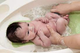Baby bathtubs are made with your baby's safety in mind. The Ultimate Guide For How To Bathe A Baby Mommy Enlightened