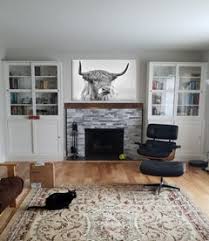 Here is our before pic of the wall with the fireplace. Shelving Around Fireplace