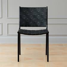 Wooden dining chairs with comfy finishing. Woven Black Leather Dining Chair Reviews Cb2