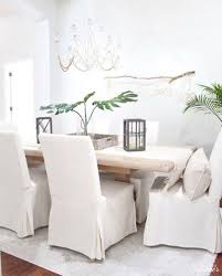Tropical Dining Room Island Style Coastal Decor Neutral Beach House Style White Slipcovered Dinin Dining Room Colors Coastal Dining Room Dinning Room Chairs