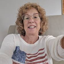 What to do when garlic plants turn yellow after scapes are pulled?