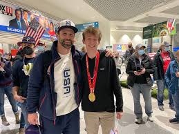 Olympian Nick Baumgartner is HOME!! 🥇 He was surprised by his son Landon  at the Green Bay airport tonight! Learn more about Baumgartner's Olympic  gold medal win: https://bit.ly/34wJ1AV