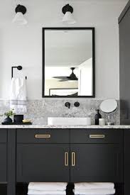 Black Bathroom Storage Cabinet Black Bathroom Vanity With Marble And Brass Jaclyn Peters Design Black Vanity Bathroom Bathroom Vanity Designs Black Cabinets Bathroom