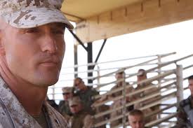 U.S. Marine Staff Sgt. Michael Baggett delivers the