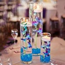 When designing a table, i look at simple but impactful, add some height to your centerpiece design with tall vases full of greenery. 300 Wedding Flower Vases Ideas Wedding Flower Vase Flower Vases Plush Flower