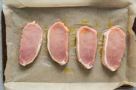 Brush pork chops with olive oil and place in the remaining space on the pan. Best Baked Pork Chops Easy Recipe Kristine S Kitchen