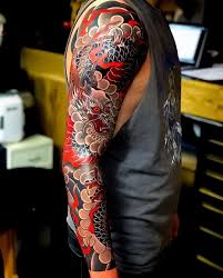 Black And Red Japanese Sleeve Tattoo Image May Contain One Or More People And Indoor Japanese Sleeve Tattoos Japanese Tattoo Sleeve Tattoos
