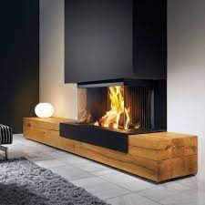 A fireplace signifies a place of coziness and warmth in your home. Dark Basement Basement Dark Basement Basement Modern Fireplace Chimney Design Fireplace Design