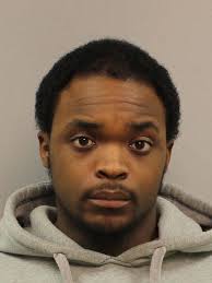 Two men charged in July shooting death