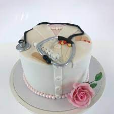 congratulations to the new doctor stethoscope pills and plasters top on the cake doctor cake d doctor graduation cake doctor cake 90th birthday cakes