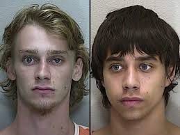 Two charged with armed home invasion robbery