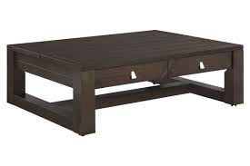 Coffee table had a dent in the side and scratches on top. Tariland Lift Top Cocktail Table With Casters By Ashley