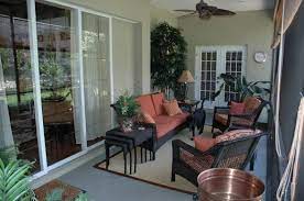 For a similar vibe, opt for sling chairs that make a statement. Decorating A Lanai In Florida Comfy Lanai We Wanted A Private Comfy Space To Just Relax And Enjoy Image Lanai Design Florida Condo Decor Lanai Decorating