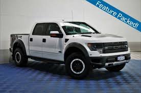 2014 Ford F150 Svt Raptor Utility Supercrew Lwb 4dr Auto 6sp 4x4 6 2i What A Brute Of A Ute Awesome Looking In White On Black Bra Raptor Car F150 Ford Trucks