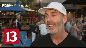 Carmel swim community gathers to watch Jake Mitchell's race