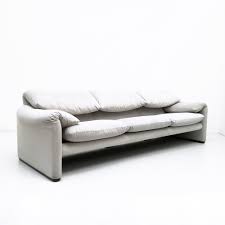 Its clever design incorporates manipulatable back cushions that can sit low, directly behind the user when seated, or extended up to provide the user with more upper back and neck support. 675 Maralunga Sofa By Vico Magistretti For Cassina 1970s 54662