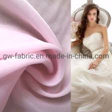 A perfect wedding dress is structured with a combination of materials. Polyester Woven Wedding Dress Fabric 20d 2080 Organza Thick Hard Yarn China Organza And Hard Yarn Price Made In China Com