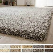 Von englisch shaggy = struppig, zottig) ist ein hochflorteppich, der sich optisch durch sein zottiges und struppiges erscheinungsbild auszeichnet. Ragolle Shaggy Hochflor Teppich Twilight Grau Weiss Beige Ebay