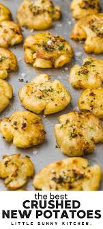 These Crushed New Potatoes With Garlic And Herbs Make A Wonderful Side Dish Easy Vegan Gluten Free An In 2020 Crushed Potatoes Potato Recipes Side Dishes New Potato