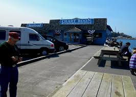 the chart room is in the busy harbor parking lot with views