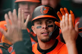 Holliday and Sugano help Orioles snap a 3-game skid with an 8-1 victory  over Royals