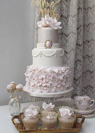 Beautiful Blush Ruffle Wedding Cake By Delicious Cakes Brooch Mould Karen Davies Sugarcraft Rose M Gray Wedding Cake Ruffle Wedding Cake Wedding Cake Roses