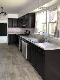 Sink base cabinet has 2 wood drawer boxes that offer a wide variety of storage possibilities. Black Cabinet Pulls For Flip House Kitchen My Creative Days