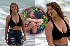 Also, she flaunts her unrivaled personality in her photoshoots that will keep anyone dazzling into her. Bindi Irwin Kisses Boyfriend Chandler In Hawaii Inside Her Romantic Vacation