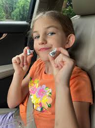 Meeting a former teacher and sharing stories with their child