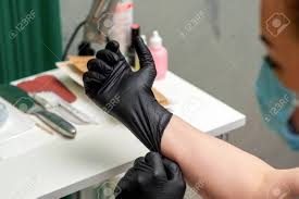 Shop aesthetic glove at an affordable price online or from your mobile. Medical Latex Black Gloves On Hand Of Cosmetologist Close Up Stock Photo Picture And Royalty Free Image Image 141548847
