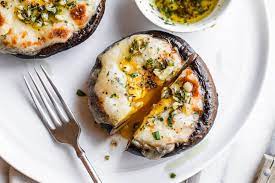 In a bowl, beat together the softened cream cheese, sour cream, parmesan cheese, oregano, garlic powder, onion powder, salt, and pepper until well combined. Cheesy Stuffed Portobello Mushrooms Recipe With Garlic Butter Sauce Eatwell101