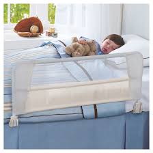 Many cribs transition into a toddler bed by removing the front rail of the crib and it's a super easy transition for most because they are not moving into a new location, just removing the full rail. Munchkin Safety Toddler Bed Rail Bed Rails For Toddlers Toddler Bed Diy Toddler Bed