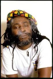Burning spear.. This person used to smoke weed like no other man. even when  he met Bob Marley in the hill of saint hanns, Bob was surprised how he was  smoking weed.