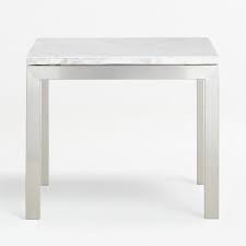 This table is best for smaller living rooms because of its round shape. Stainless Steel Tables With White Marble Tops Crate And Barrel Uae